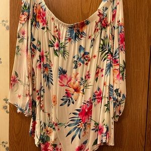 Beautiful shirt I bought from a Boutique. Can be worn up or off the shoulders.